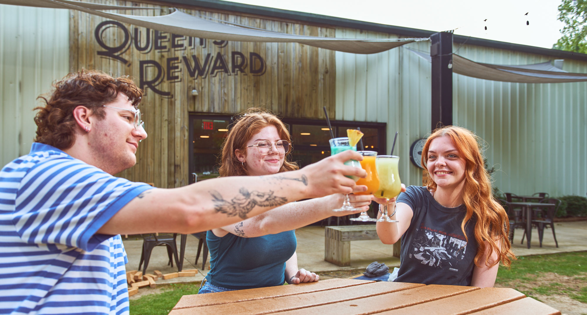 friends celebrating at Queen's Reward Meadery in Tupelo, MS.